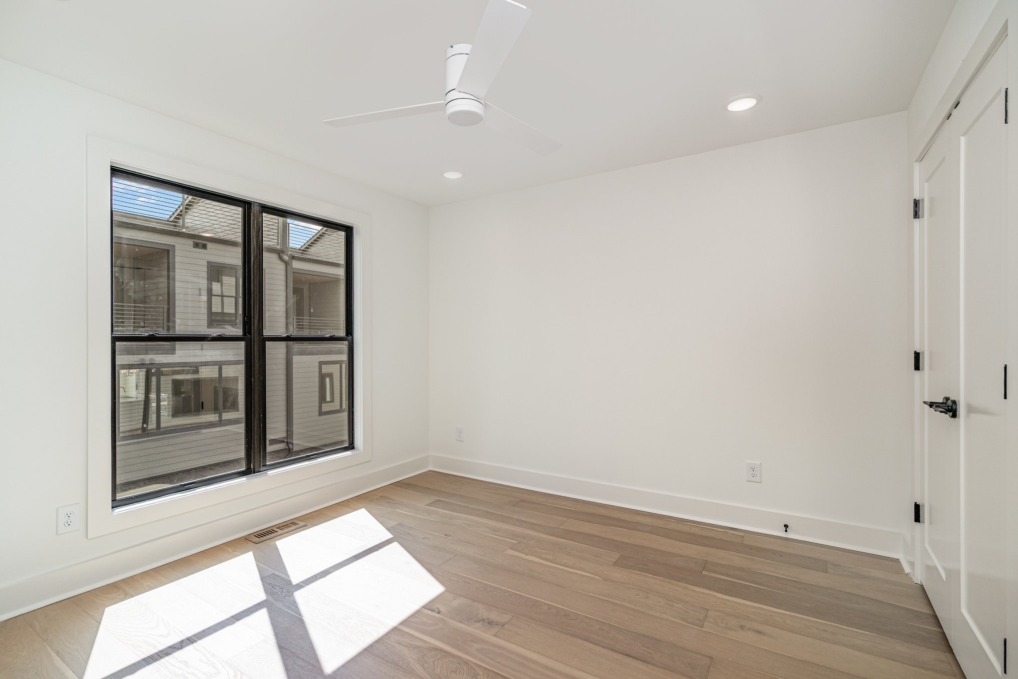 546 A Rosedale Avenue, Unit 15 Nashville, TN 37211 - Photo 23 of 40 a view of empty room with wooden floor and fan