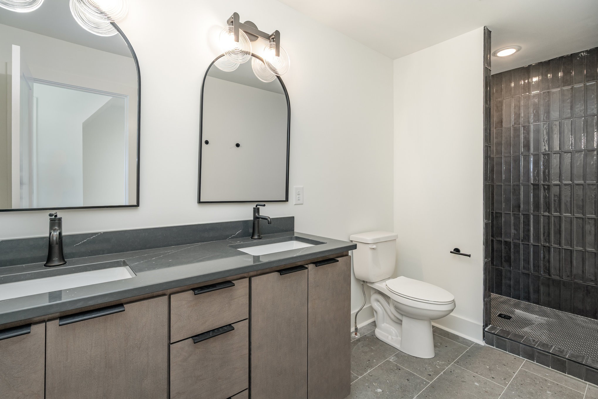546 A Rosedale Avenue, Unit 15 Nashville, TN 37211 - Photo 24 of 40 a bathroom with a toilet sink and mirror