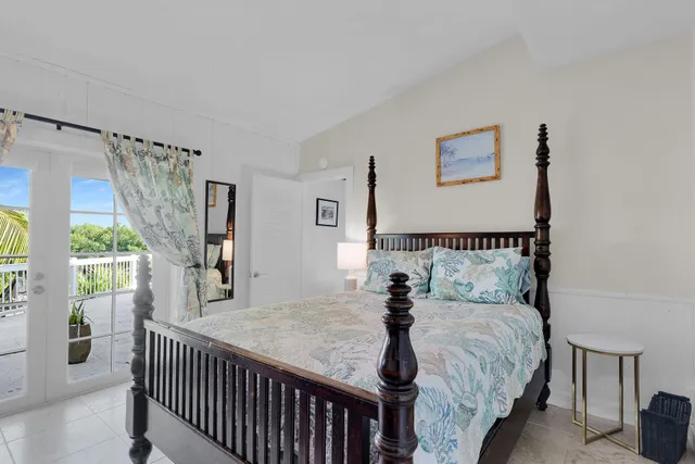 a kitchen with stainless steel appliances a stove a sink and a refrigerator