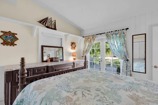 a kitchen with a stove a sink and a microwave