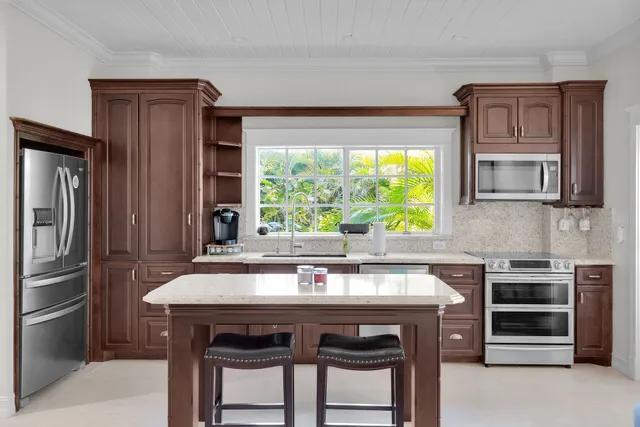 a bathroom with a shower and a sink