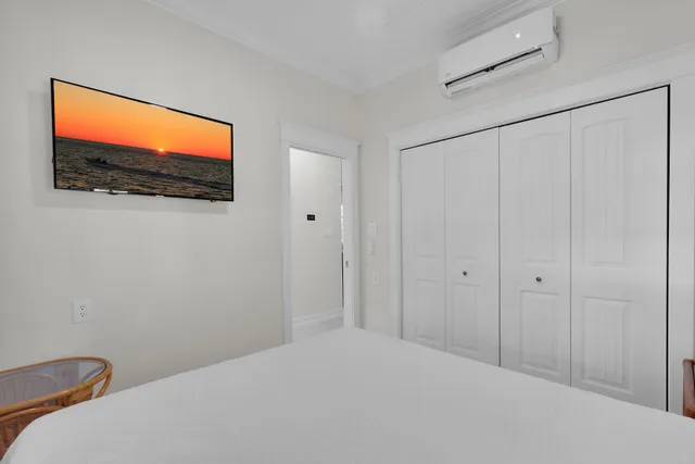 a kitchen with a stove a sink and a refrigerator