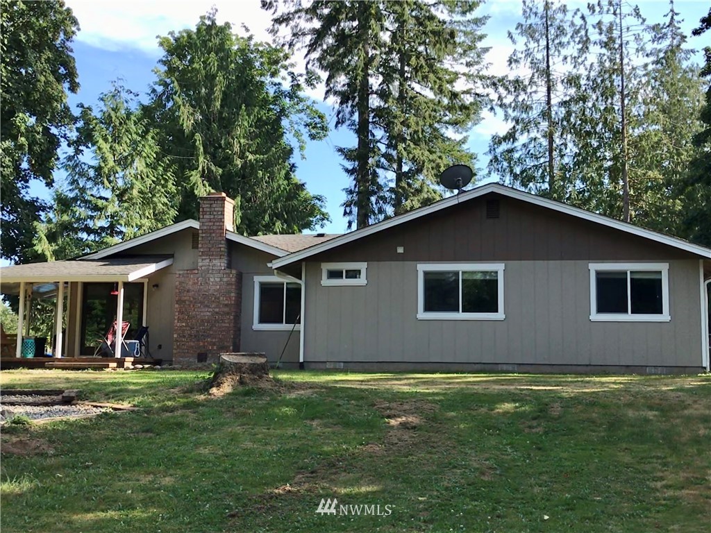 173 River Heights Road Centralia, WA 98531 - Photo 3 of 40 a house that has a tree in front of it