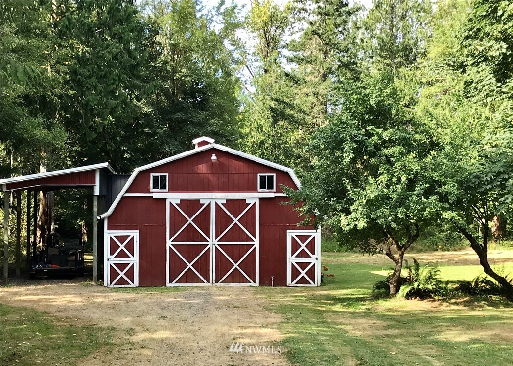 173 River Heights Road Centralia, WA 98531 - Photo 27 of 40 a front view of a house with a yard