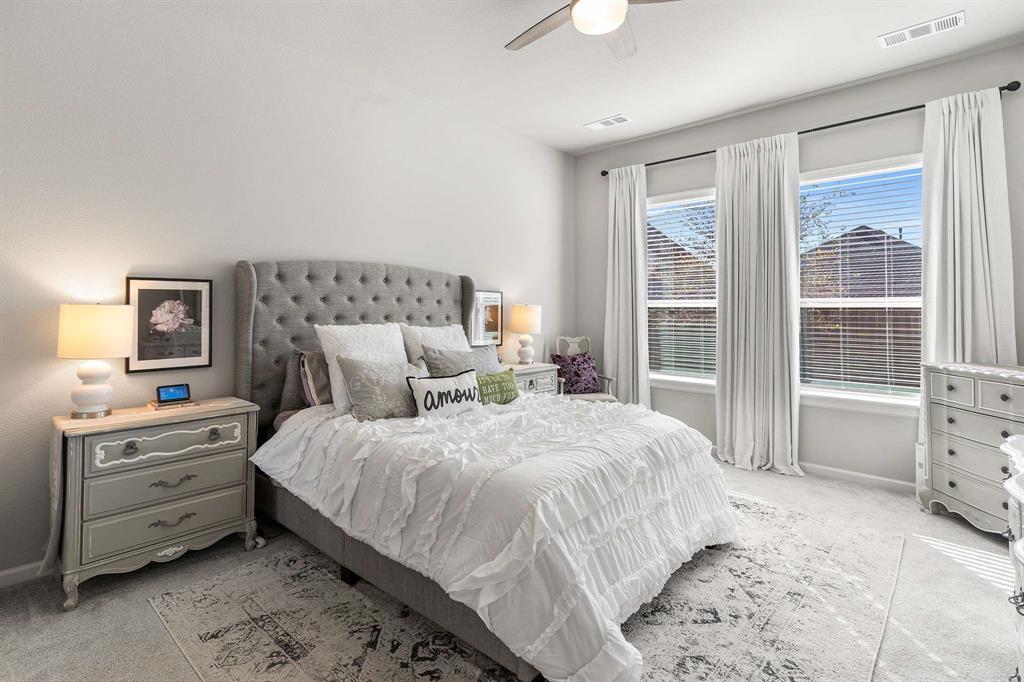 1609 Cotton Road Van Alstyne, TX 75495 - Photo 15 of 27 a bedroom with a bed and a dresser