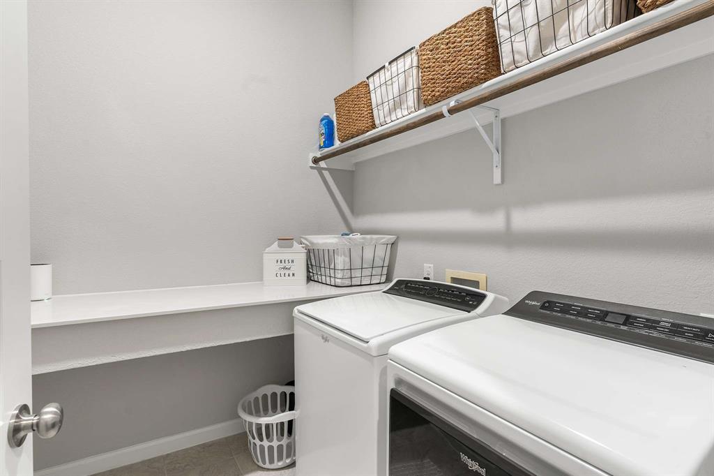 1609 Cotton Road Van Alstyne, TX 75495 - Photo 22 of 27 a utility room with dryer and washer