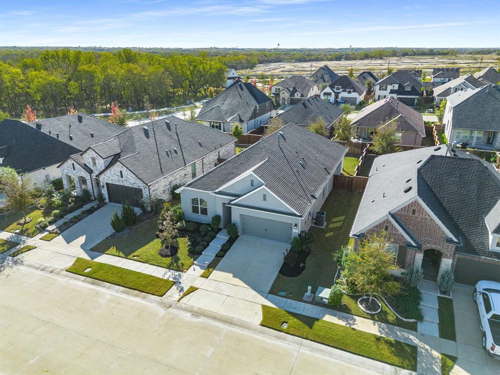 1609 Cotton Road Van Alstyne, TX 75495 - Photo 25 of 27 an aerial view of residential houses with outdoor space