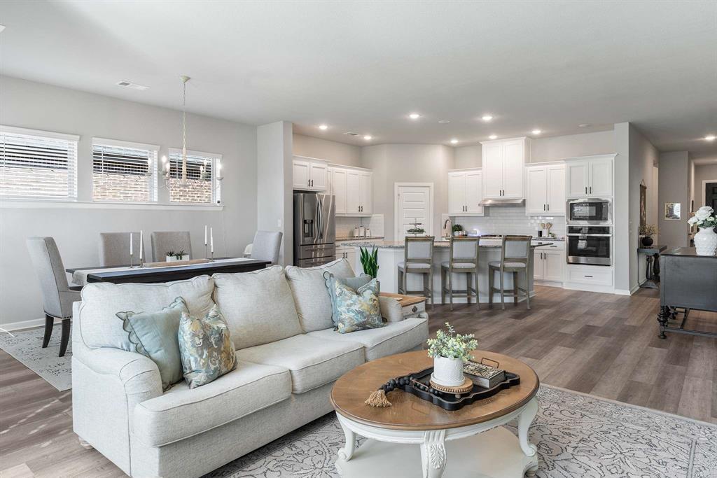 1609 Cotton Road Van Alstyne, TX 75495 - Photo 8 of 27 a living room with furniture and kitchen view