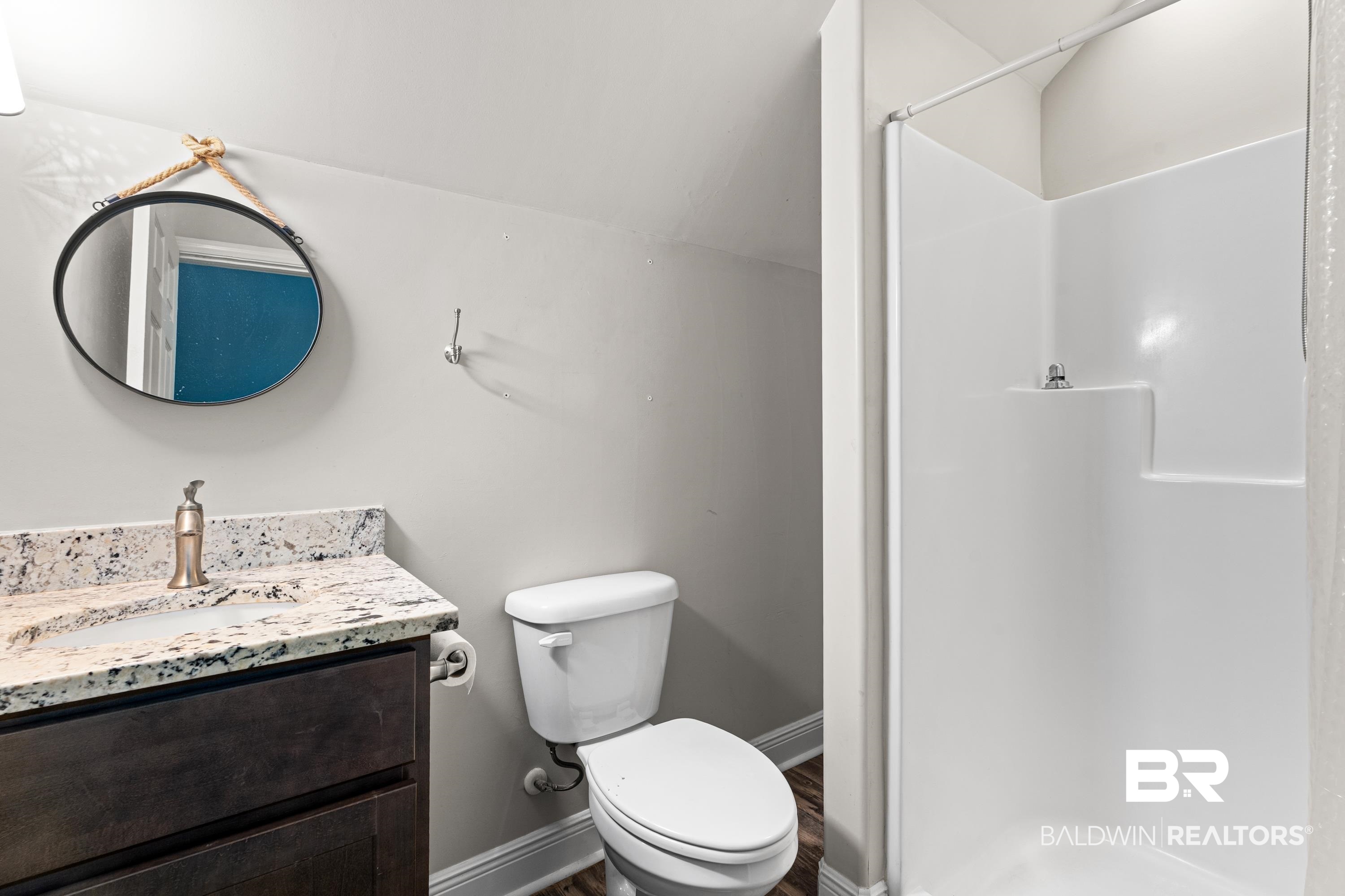 1113 Yellow Daisy Lane Foley, AL 36535 - Photo 30 of 35 Bathroom featuring a shower stall and vanity