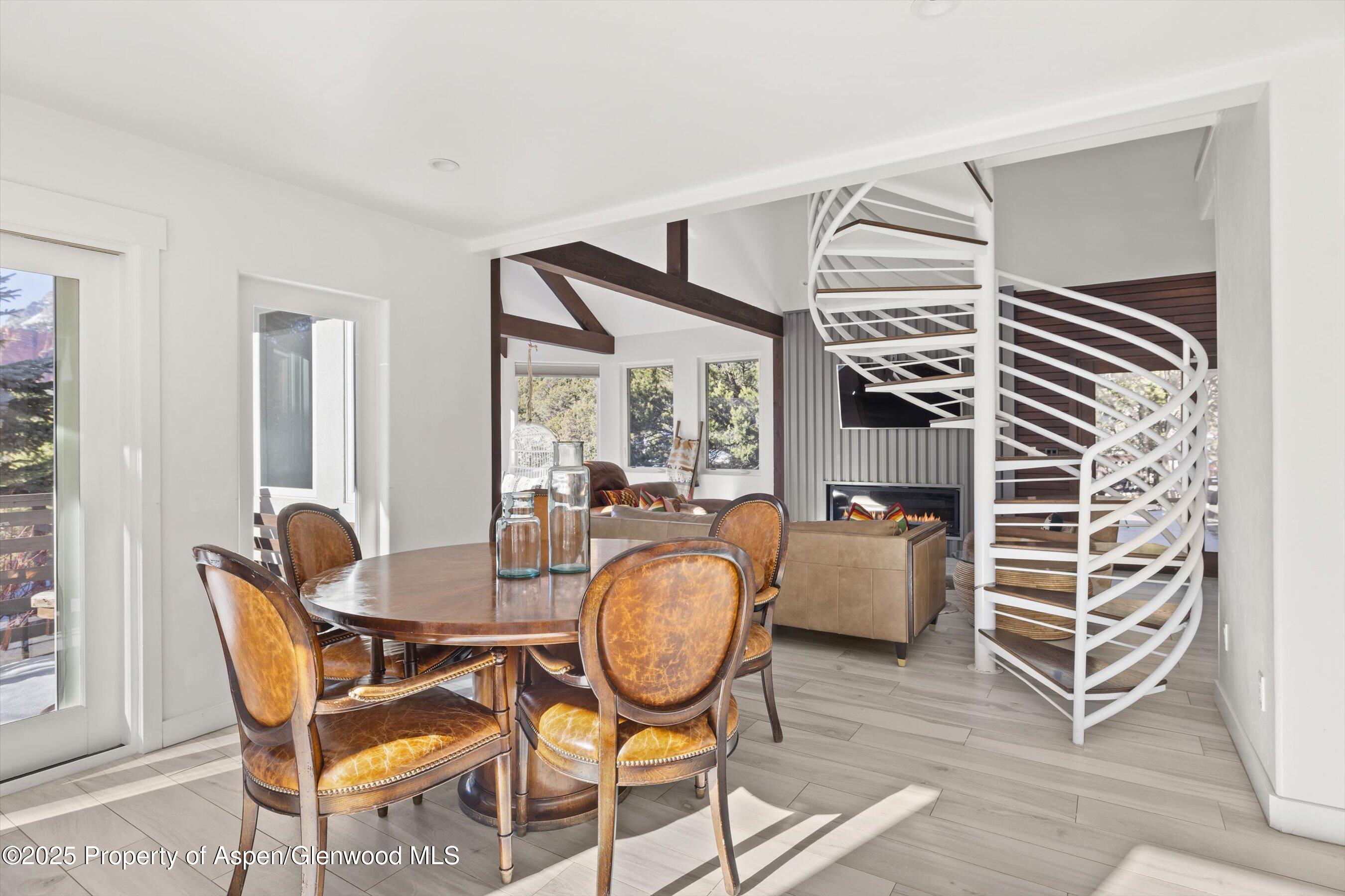 163 Castle Lane Basalt, CO 81621 - Photo 11 of 28 a living room with furniture a rug and a window