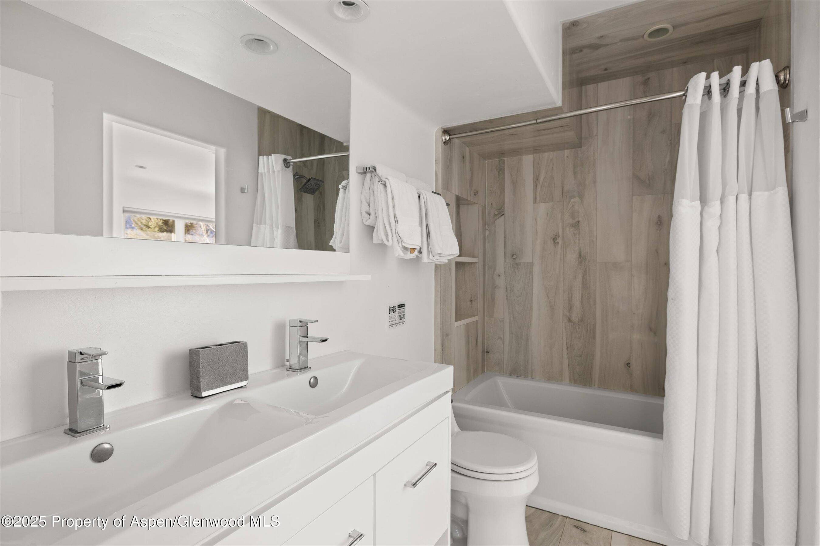 163 Castle Lane Basalt, CO 81621 - Photo 16 of 28 a bathroom with a sink toilet and shower