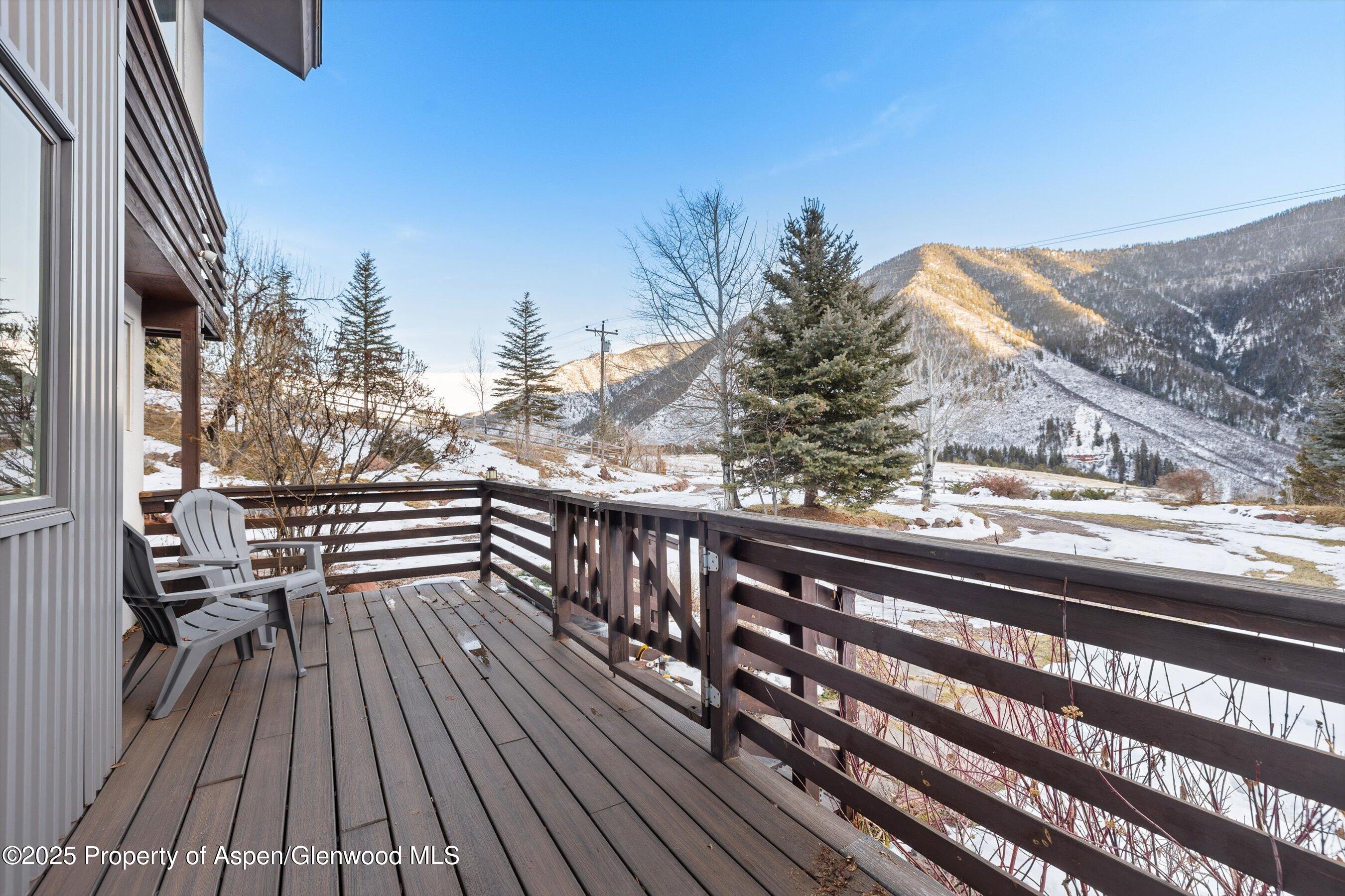 163 Castle Lane Basalt, CO 81621 - Photo 20 of 28 a view of balcony with wooden floor and fence