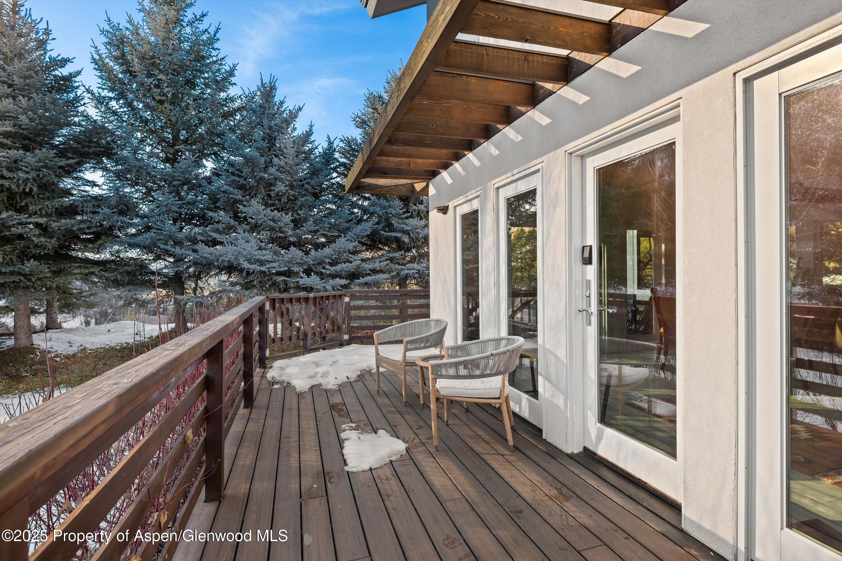 163 Castle Lane Basalt, CO 81621 - Photo 21 of 28 a view of balcony with chairs and wooden fence