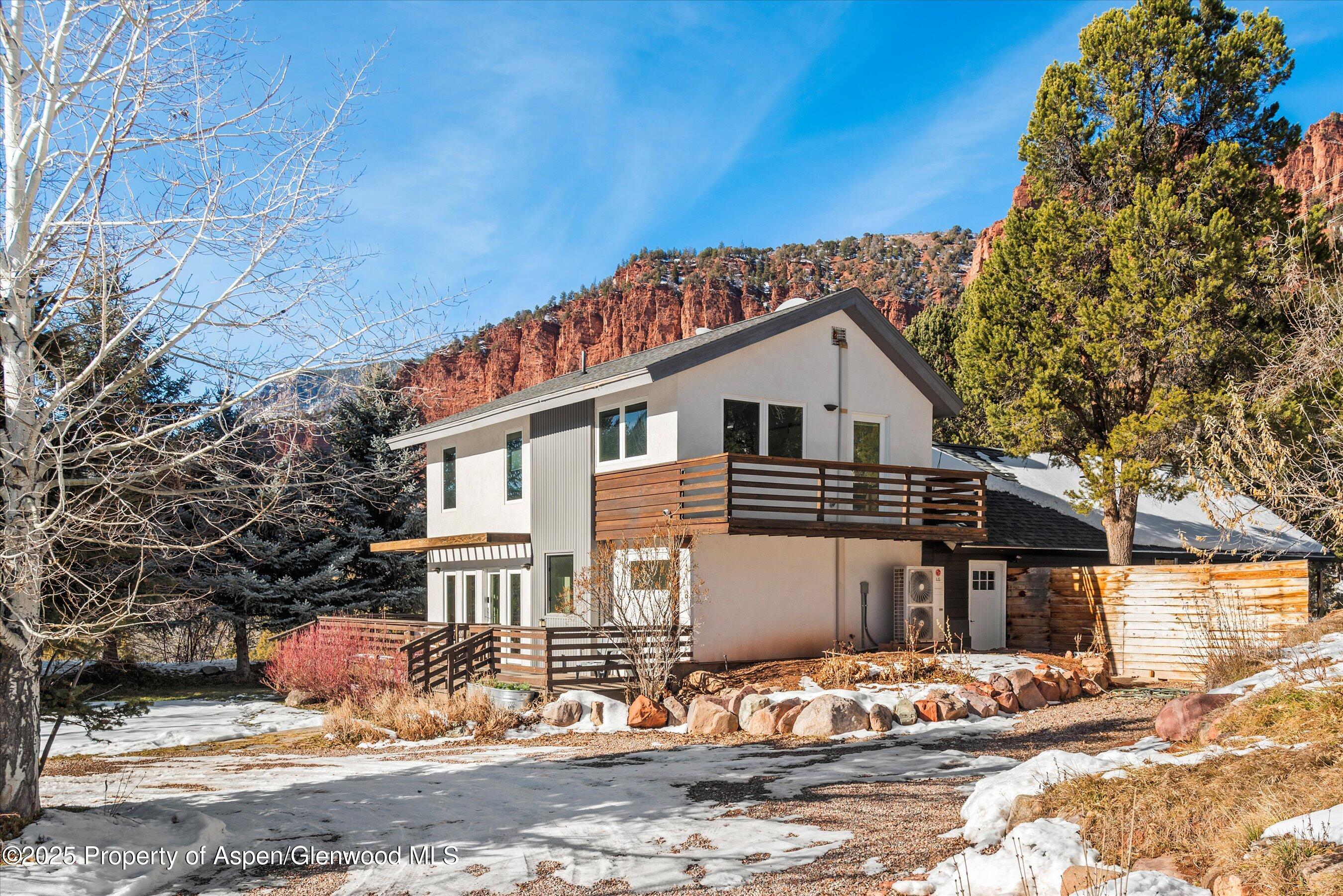 163 Castle Lane Basalt, CO 81621 - Photo 27 of 28 a front view of a house with a yard