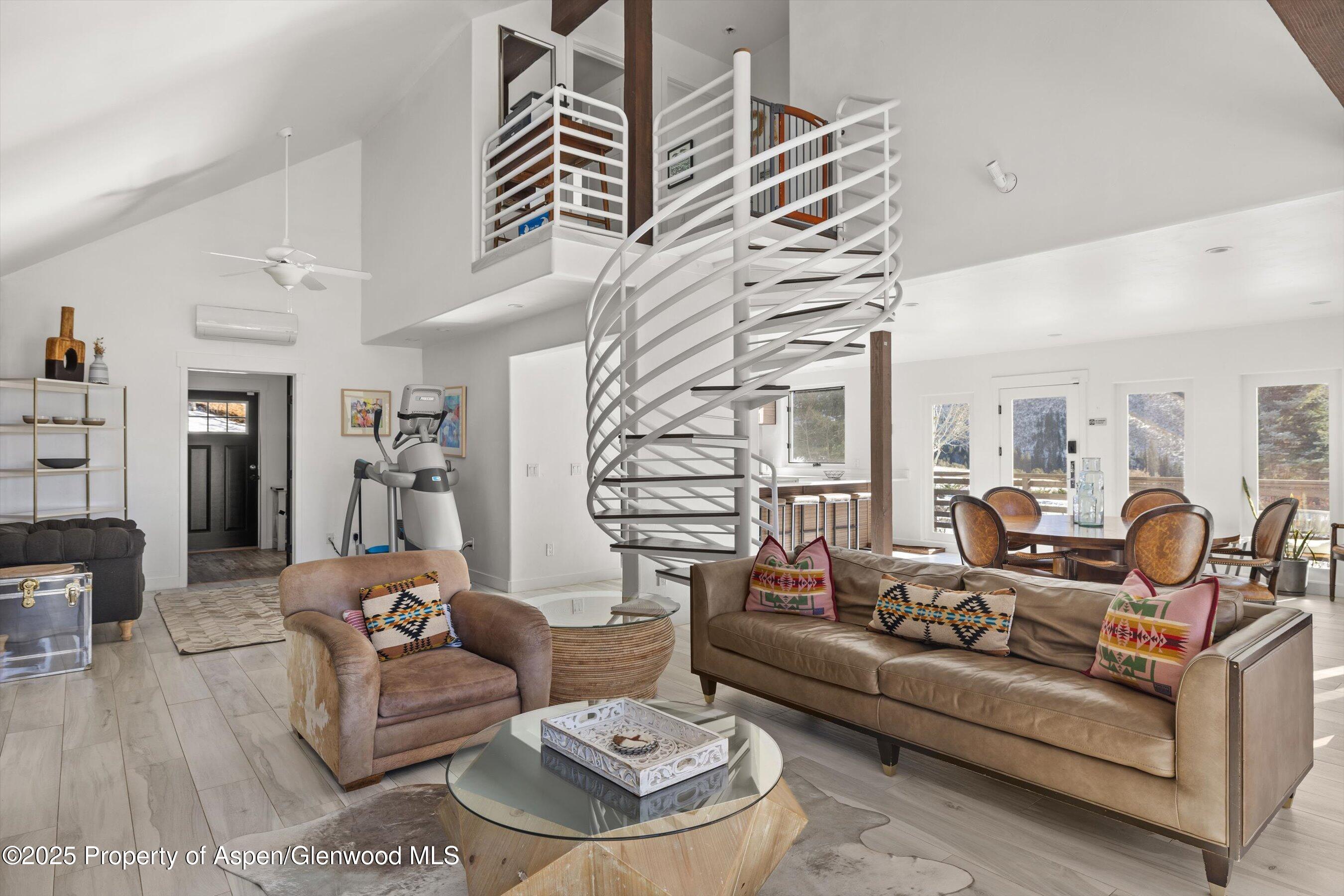163 Castle Lane Basalt, CO 81621 - Photo 4 of 28 a living room with furniture and wooden floor