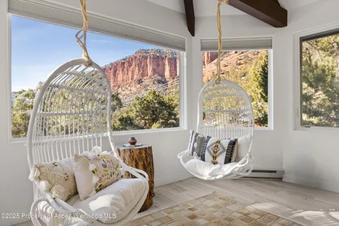 a living room with furniture and a window