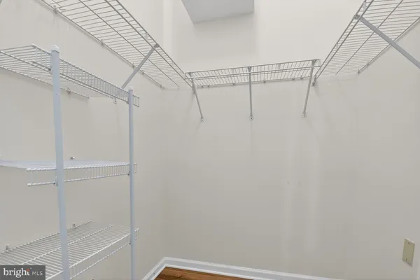 a view of a room with racks on the wall