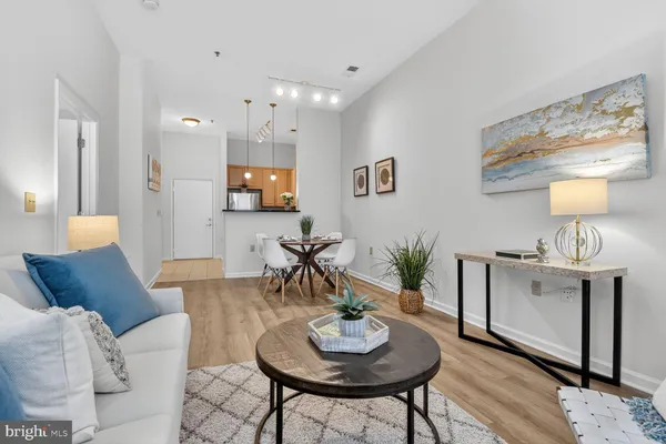 a living room with furniture and a table