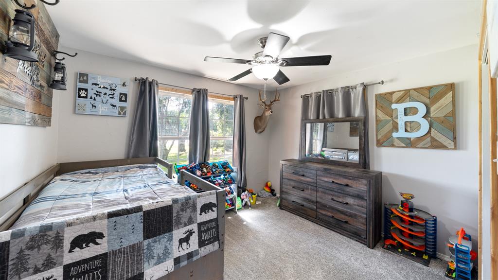29080 Highway 19 Athens, TX 75752 - Photo 18 of 30 a bedroom with bed and a window