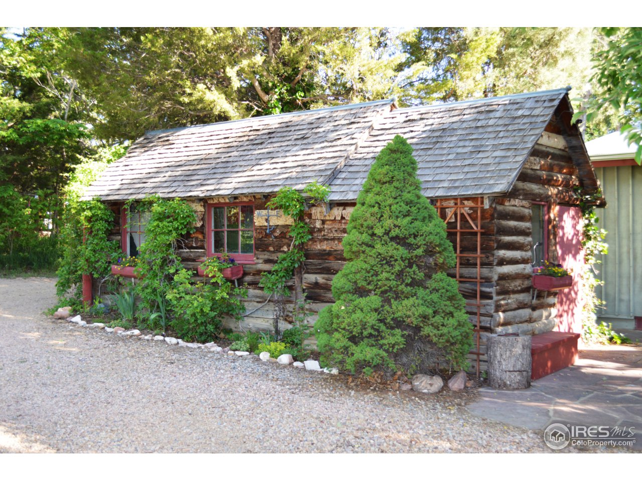 5740 Prospect Road Longmont, CO 80503 - Photo 7 of 21 Old Log Cabin