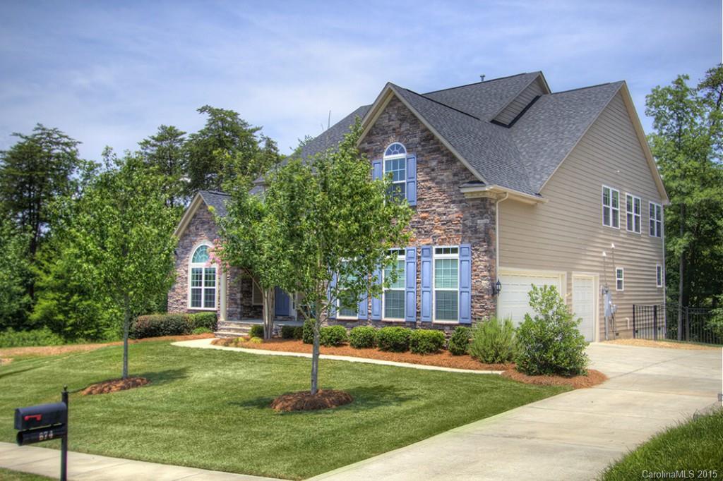 674 Reliance Court Tega Cay, SC 29708 - Photo 2 of 24 a front view of a house with a yard