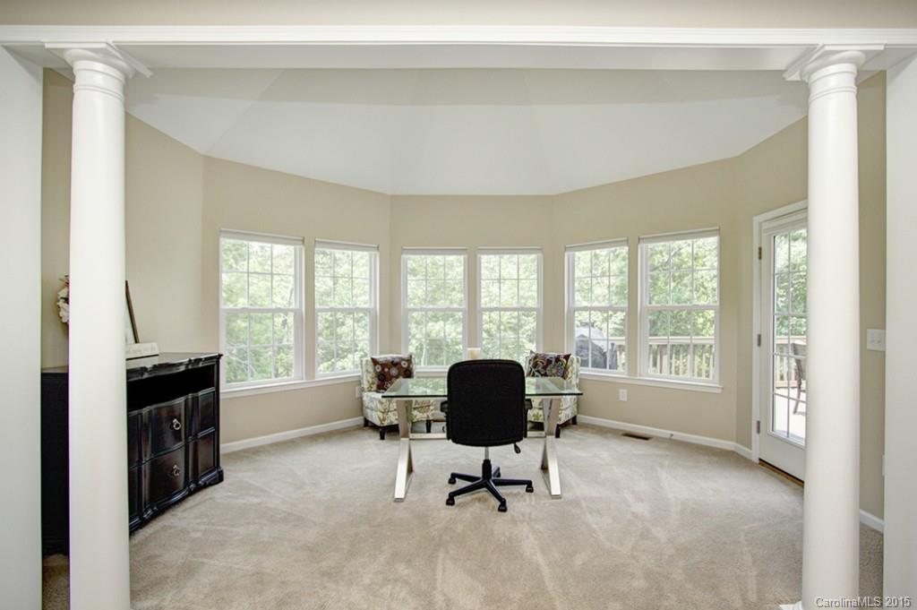 674 Reliance Court Tega Cay, SC 29708 - Photo 14 of 24 a view of a livingroom with workspace and a window