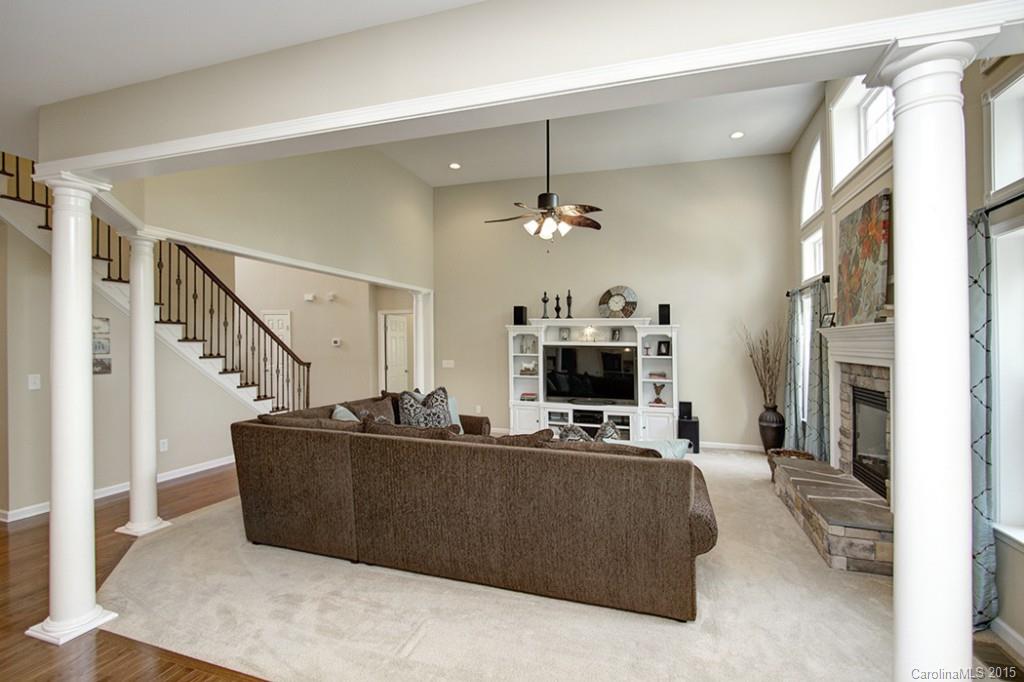674 Reliance Court Tega Cay, SC 29708 - Photo 5 of 24 a living room with furniture and a flat screen tv