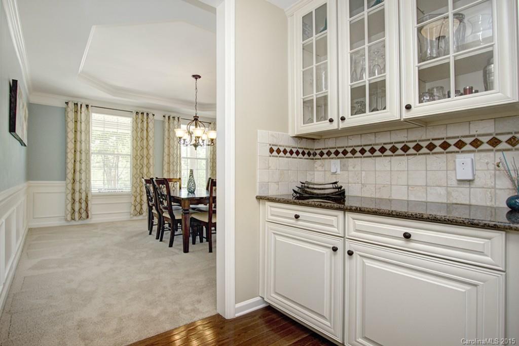 674 Reliance Court Tega Cay, SC 29708 - Photo 7 of 24 a kitchen with cabinets and window