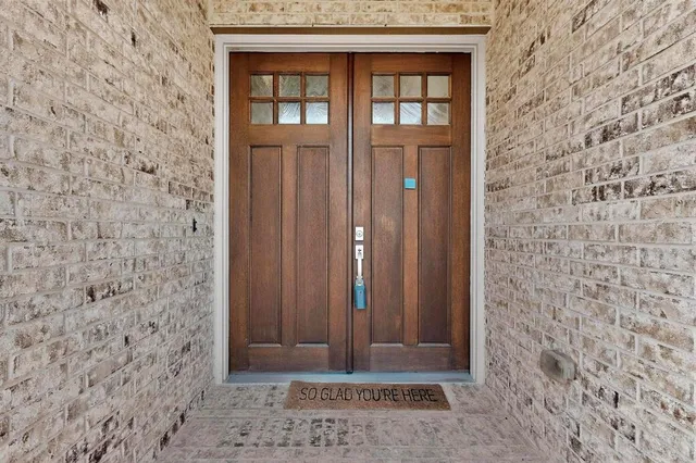 a living room with furniture fireplace and a flat screen tv