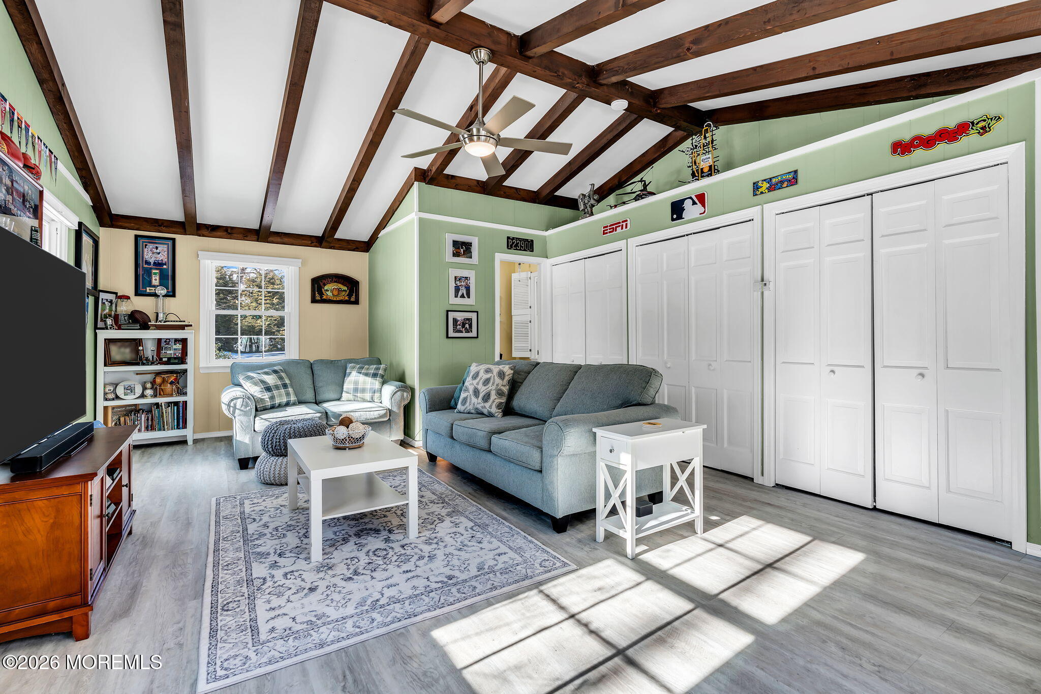 72 Idlebrook Lane Aberdeen, NJ 07747 - Photo 17 of 46 a living room with furniture a flat screen tv and next to a window
