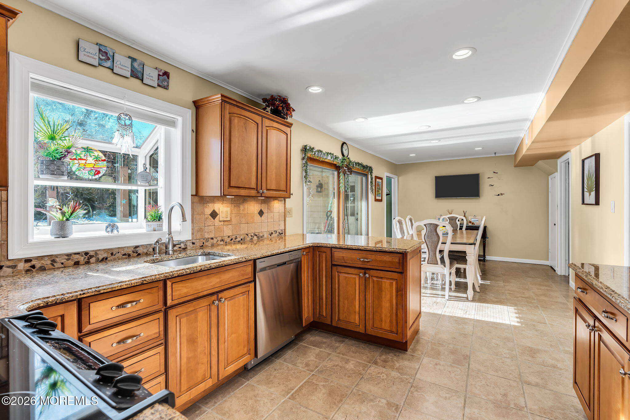 72 Idlebrook Lane Aberdeen, NJ 07747 - Photo 26 of 46 a kitchen with stainless steel appliances granite countertop sink stove and cabinets
