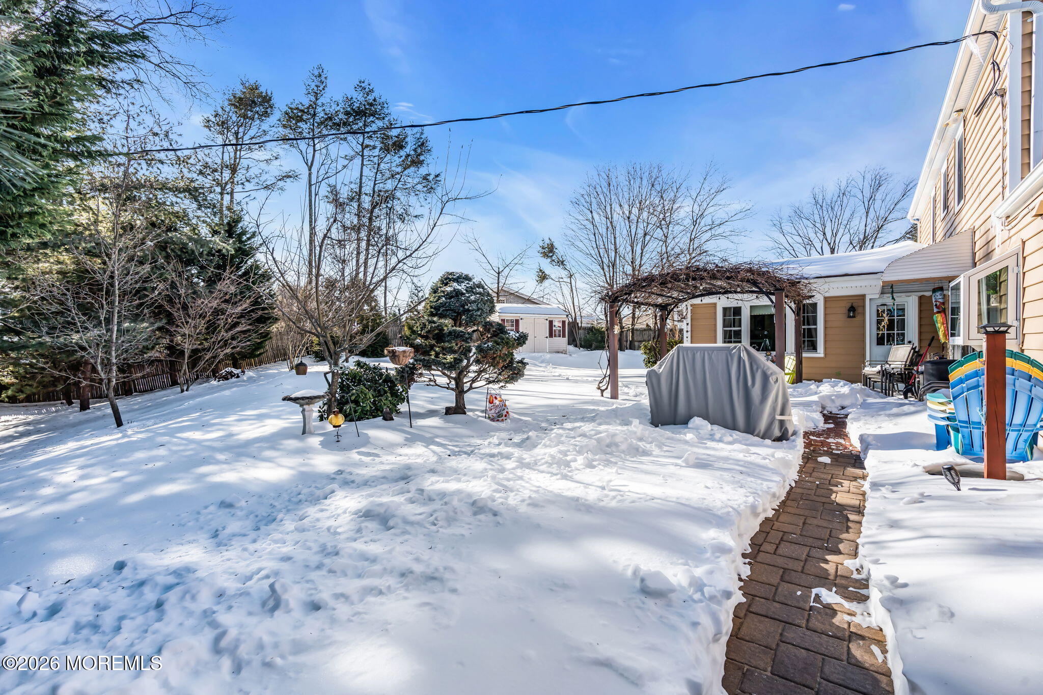 72 Idlebrook Lane Aberdeen, NJ 07747 - Photo 37 of 46 a view of a house with a snow in the yard