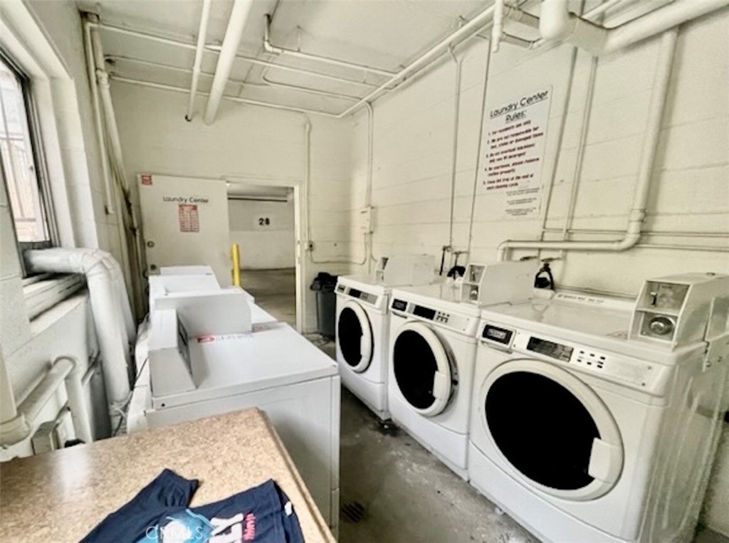13717 Chadron Avenue, Unit 16 Hawthorne, CA 90250 - Photo 10 of 11 a utility room with dryer and washer