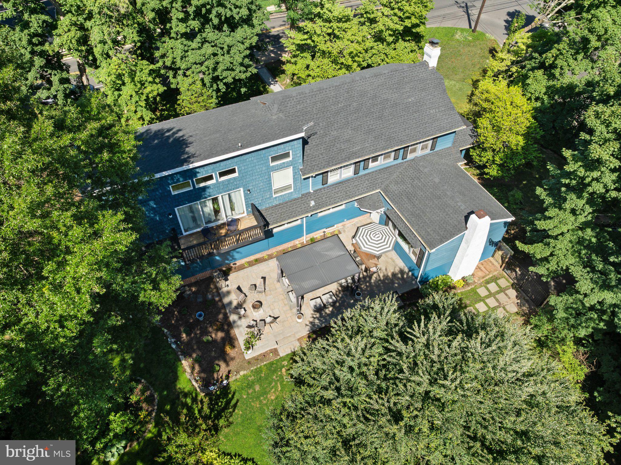 400 North Stanwick Road Moorestown, NJ 08057 - Photo 51 of 54 Charming blue home embraced by greenery.