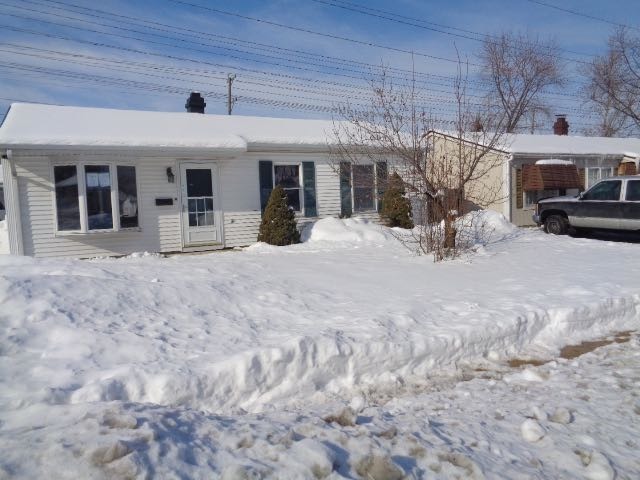 446 Montrose Drive Romeoville, IL 60446 - Photo 1 of 23 a view of a house with a snow in the yard