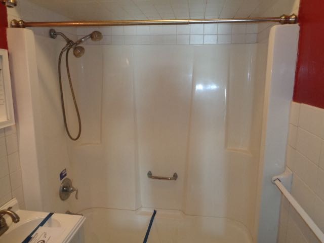 446 Montrose Drive Romeoville, IL 60446 - Photo 15 of 23 a bathroom with a shower