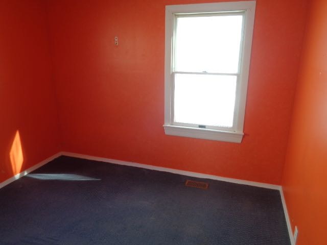 446 Montrose Drive Romeoville, IL 60446 - Photo 17 of 23 an empty room with a window