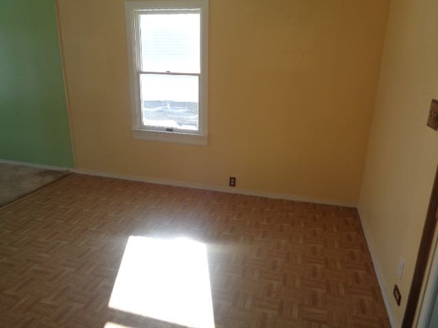 446 Montrose Drive Romeoville, IL 60446 - Photo 7 of 23 an empty room with a window