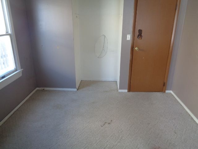 446 Montrose Drive Romeoville, IL 60446 - Photo 8 of 23 an empty room with windows