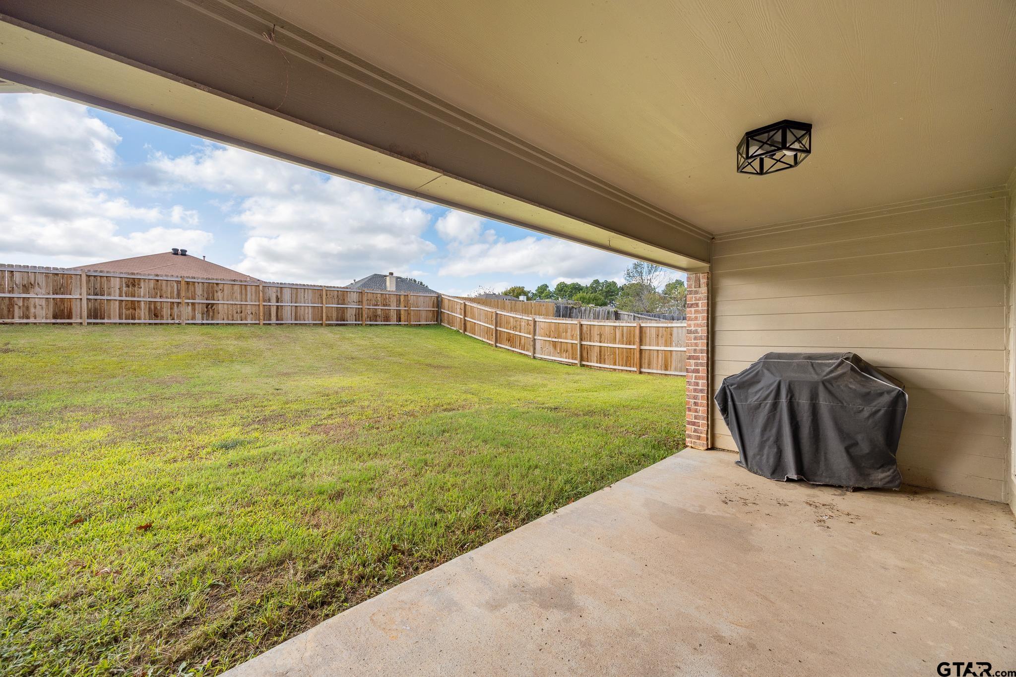 209 Cass Circle Tyler, TX 75703 - Photo 28 of 33 a view of a big room with a big yard