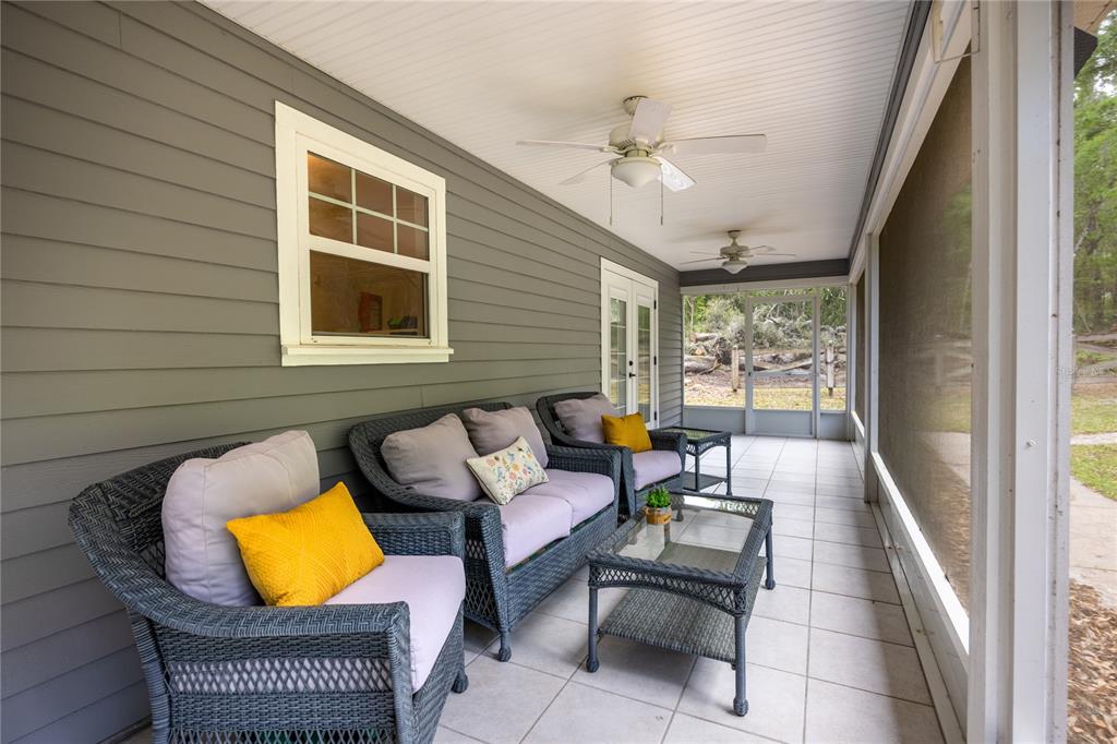 5028 Southwest 47th Street Gainesville, FL 32608 - Photo 15 of 49 a outdoor space with chairs