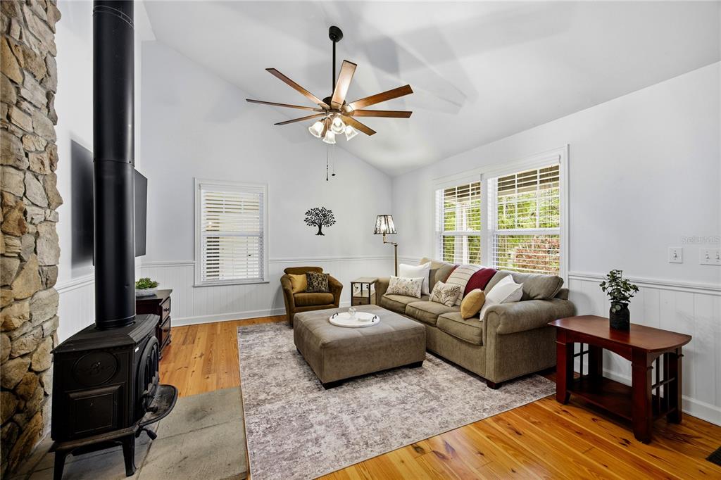 5028 Southwest 47th Street Gainesville, FL 32608 - Photo 29 of 49 a living room with furniture and a window