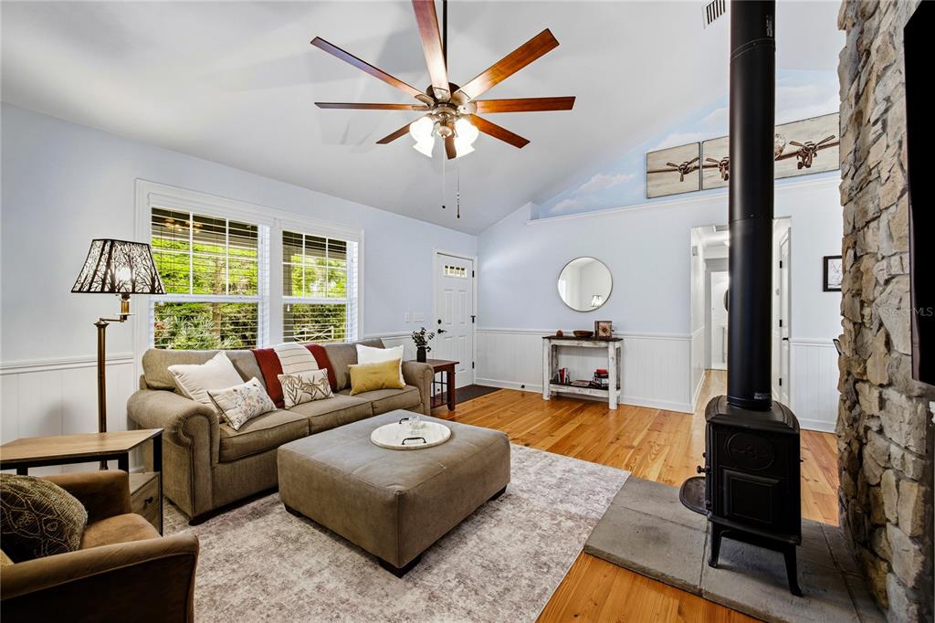 5028 Southwest 47th Street Gainesville, FL 32608 - Photo 30 of 49 a living room with furniture and a large window
