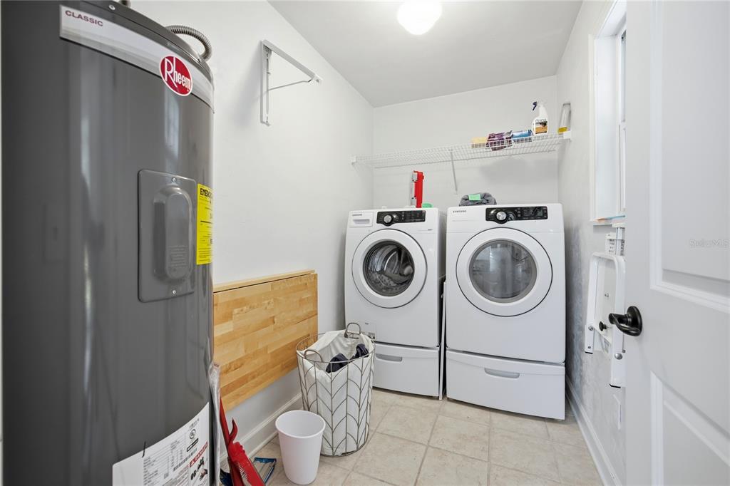 5028 Southwest 47th Street Gainesville, FL 32608 - Photo 35 of 49 a utility room with dryer and washer