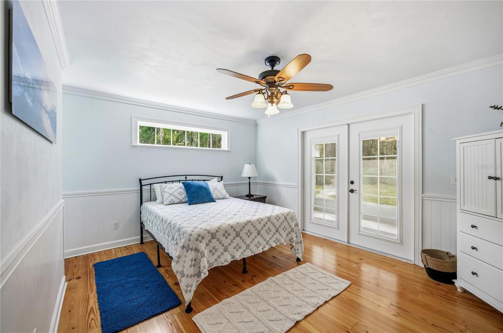 5028 Southwest 47th Street Gainesville, FL 32608 - Photo 46 of 49 a bedroom with a bed and a window