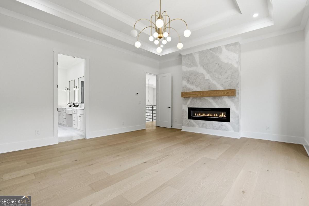 1557 Whitley Road Dacula, GA 30019 - Photo 18 of 46 a view of an empty room with a fireplace