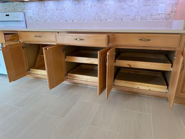 a view of room with wooden floor