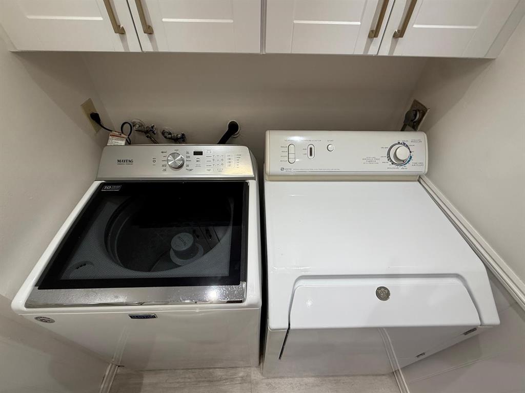 2911 Southwest 22nd Circle, Unit 37B Delray Beach, FL 33445 - Photo 17 of 51 a utility room with washer and dryer