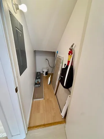 a view of an empty room with stairs