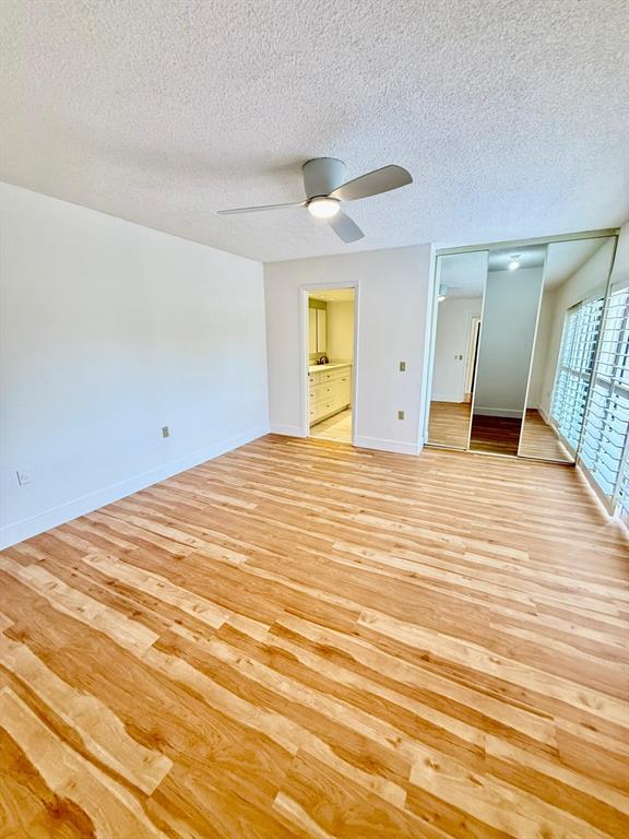 2911 Southwest 22nd Circle, Unit 37B Delray Beach, FL 33445 - Photo 24 of 51 a view of empty room with wooden floor